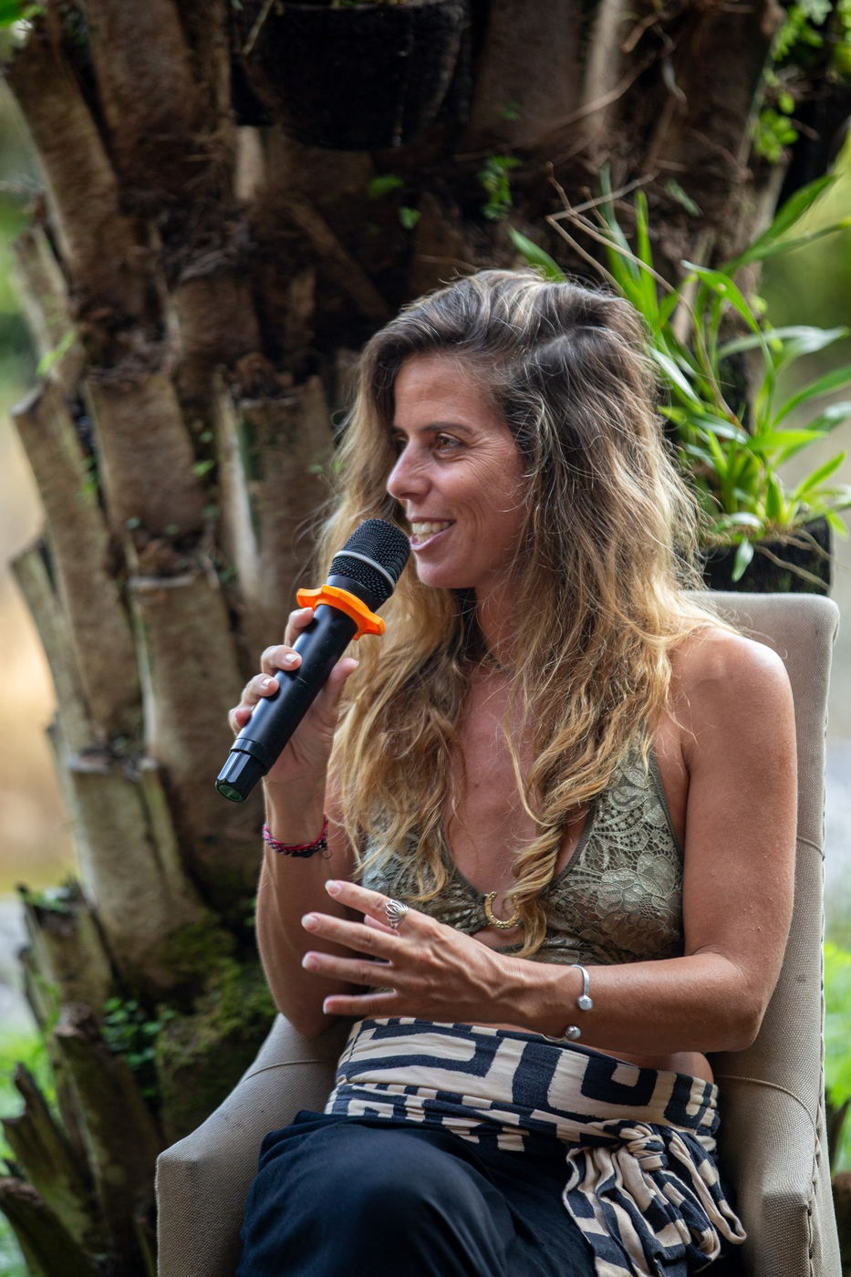 Estella speaking at the salon