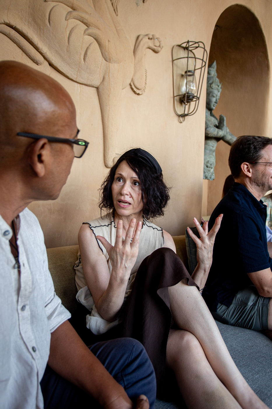 Woman speaking animatedly in conversation