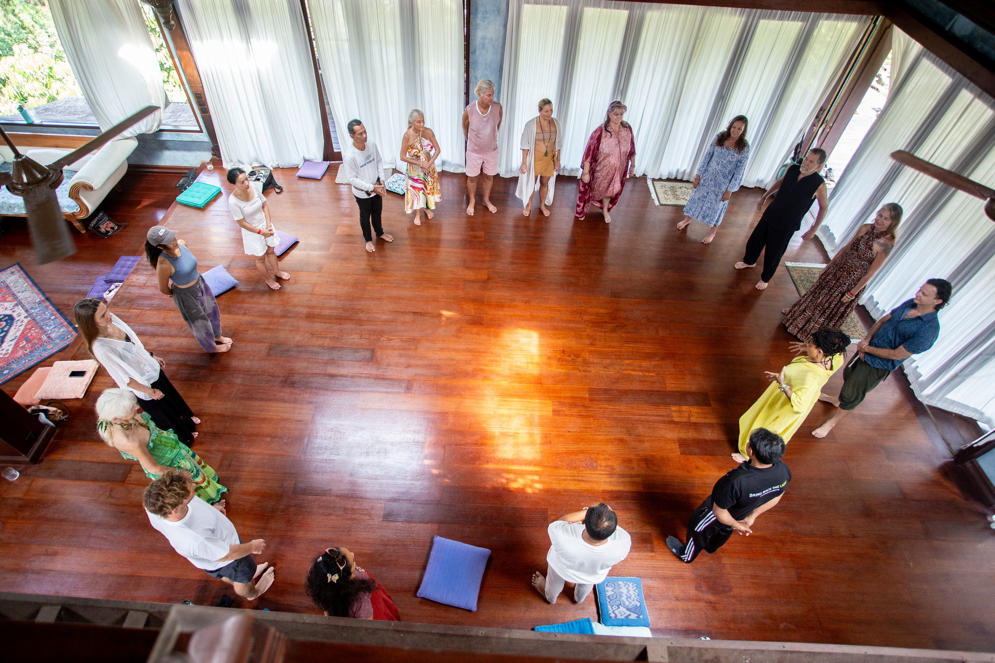 Overhead view of the full circle gathered at Bhakti Marga