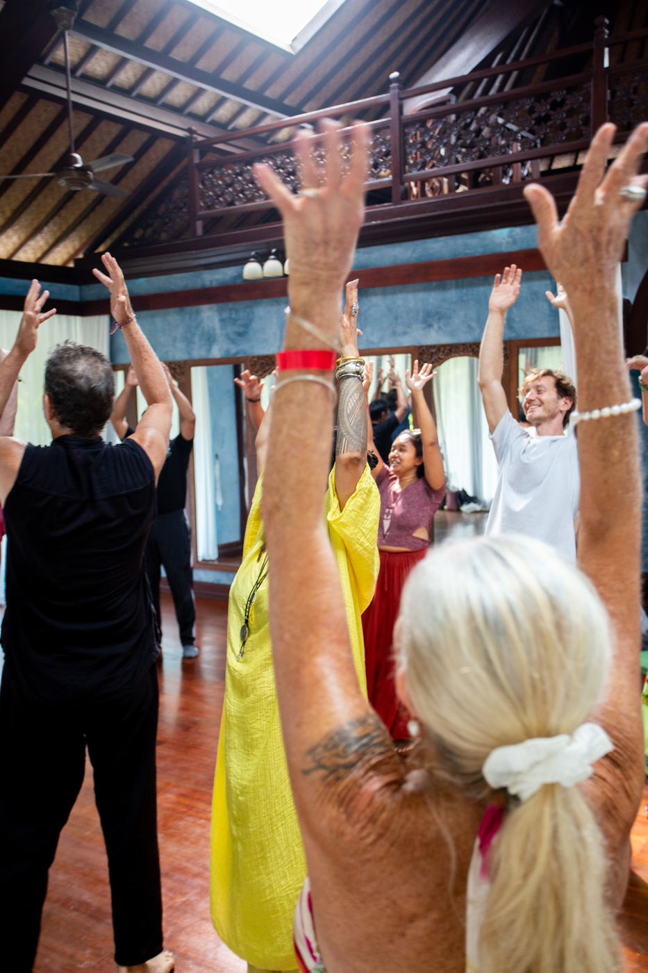 Arms lifted in the middle of the room