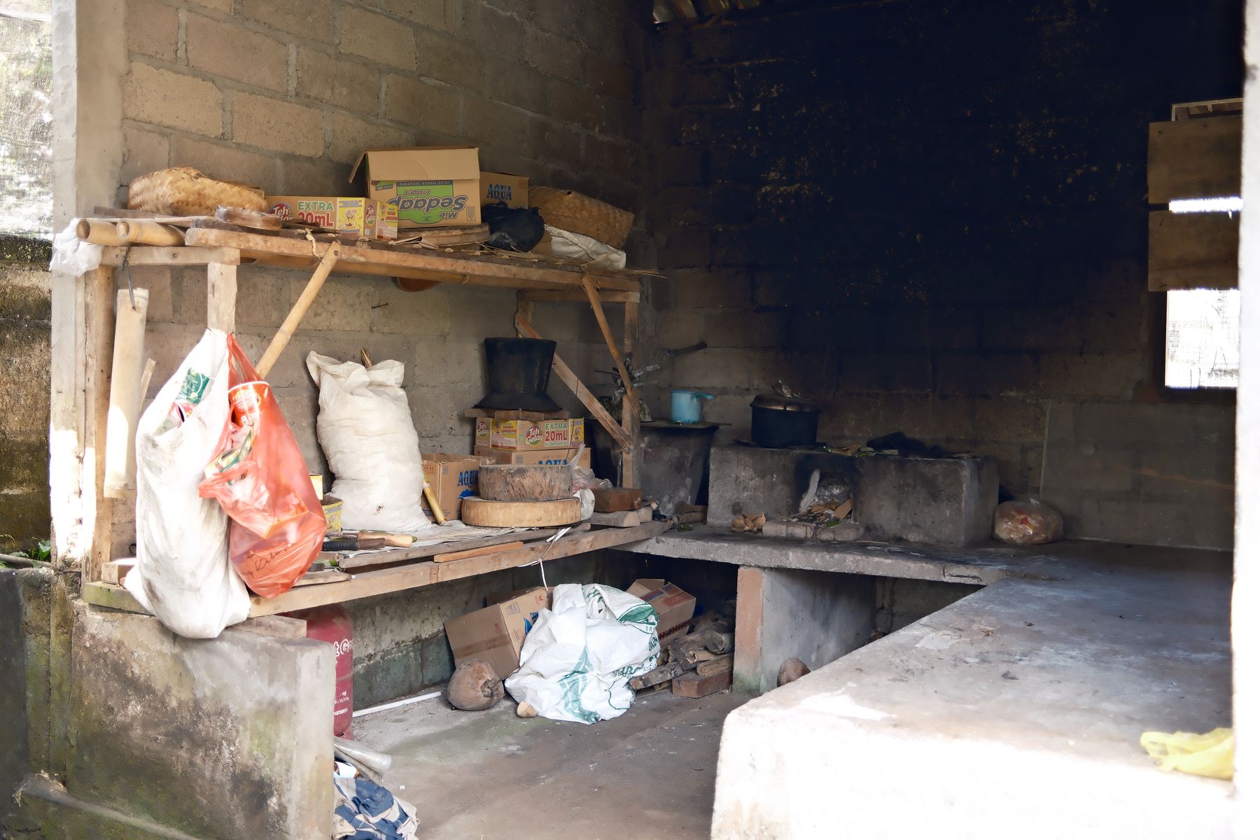 A traditional village kitchen with its wood-fired clay stove